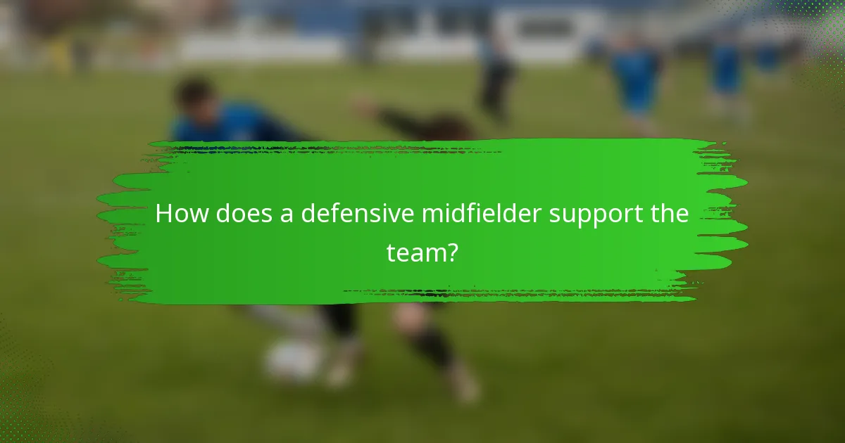 How does a defensive midfielder support the team?